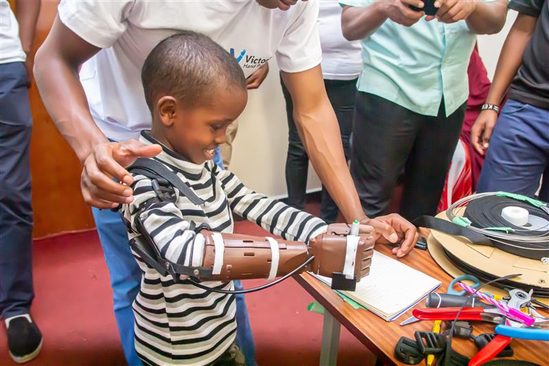 boy with prosthetic - Victoria Hand